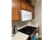 Kitchen featuring overhead microwave, cabinets, and gas range stove at 107 Providence Run, Dallas, GA 30157