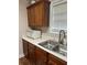 Kitchen featuring stainless steel sink, faucet, and modern cabinetry at 107 Providence Run, Dallas, GA 30157