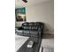 Comfortable living room with plush seating, a ceiling fan, and large artwork at 107 Providence Run, Dallas, GA 30157