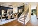 Formal dining room with elegant decor and a staircase to the right at 3470 Austin Michael Ln, Cumming, GA 30028