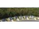 New construction homes in a wooded neighborhood with landscaped yards and paved driveways at 358 Friendship Oak Way, Hampton, GA 30228