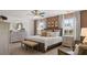 Spacious main bedroom with a ceiling fan, neutral decor, and an abundance of natural light at 358 Friendship Oak Way, Hampton, GA 30228