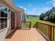 Back deck with a railing and beautiful view of the back yard at 4335 Northwind Dr, Ellenwood, GA 30294