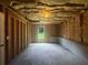 Unfinished basement with insulated walls and framing ready for customization at 4335 Northwind Dr, Ellenwood, GA 30294