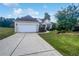 Charming single-story home with a well-manicured lawn, two-car garage, and inviting front entrance at 4335 Northwind Dr, Ellenwood, GA 30294