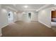 Finished basement area with recessed lighting, neutral carpet, and a mini-split system at 4335 Northwind Dr, Ellenwood, GA 30294