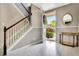 Foyer featuring light gray floors, stairs to the upper level, and decorative accents at 2951 Edgewater St, South Fulton, GA 30331
