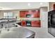 Functional kitchen featuring modern appliances, granite counters, and plenty of cabinet space at 2951 Edgewater St, South Fulton, GA 30331