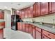 Well-appointed kitchen with stainless steel appliances, granite countertops, and ample storage space at 2951 Edgewater St, South Fulton, GA 30331