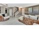 Cozy living room with hardwood floors, comfortable seating, and neutral color palette at 2951 Edgewater St, South Fulton, GA 30331