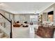 Spacious living room featuring hardwood floors, ample natural light, and comfortable, stylish seating at 2951 Edgewater St, South Fulton, GA 30331