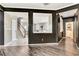 Open-concept design with hardwood floors and views of staircase at 2951 Edgewater St, South Fulton, GA 30331