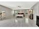 Spacious main bedroom featuring hardwood floors, sitting area, ceiling fan, and windows with lots of natural light at 2951 Edgewater St, South Fulton, GA 30331