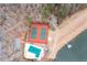 Aerial view of the community amenities including a pool, tennis courts, and lake access at 3205 Brandywine Nw Pl, Marietta, GA 30064