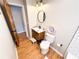 Bathroom with vanity, tile floors, toilet, and a small shelf, with modern decor at 3205 Brandywine Nw Pl, Marietta, GA 30064
