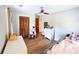 Bedroom featuring closet doors and a ceiling fan and neutral color palette at 3205 Brandywine Nw Pl, Marietta, GA 30064