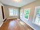 Bright bedroom featuring hardwood floors, natural light, and neutral paint at 3205 Brandywine Nw Pl, Marietta, GA 30064