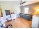 Bedroom featuring a twin bed, white dresser, a ceiling fan, and hardwood floors at 3205 Brandywine Nw Pl, Marietta, GA 30064