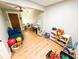 Large playroom with hardwood floors and ample room for fun at 3205 Brandywine Nw Pl, Marietta, GA 30064