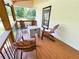 Relaxing porch area with wooden chairs, a fire pit, and a view of the surrounding greenery at 3205 Brandywine Nw Pl, Marietta, GA 30064
