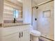Bathroom featuring white cabinets, granite counters, and tiled shower at 3959 Wood Path Dr, Stone Mountain, GA 30083