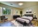 Bedroom with stylish decor, modern flooring, and natural light at 3959 Wood Path Dr, Stone Mountain, GA 30083