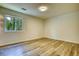 Bedroom with modern flooring, neutral paint and natural light from window at 3959 Wood Path Dr, Stone Mountain, GA 30083