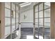 Bright bonus room with french doors and modern flooring at 3959 Wood Path Dr, Stone Mountain, GA 30083