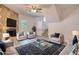 Staged living room featuring stone fireplace and modern furniture at 3959 Wood Path Dr, Stone Mountain, GA 30083