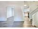 Bright living area featuring modern flooring, fresh paint, and open layout at 3959 Wood Path Dr, Stone Mountain, GA 30083