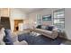 Bright and staged living room featuring stone fireplace and stairs at 3959 Wood Path Dr, Stone Mountain, GA 30083