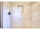Modern shower with marble tile surround and built-in soap niche at 3959 Wood Path Dr, Stone Mountain, GA 30083