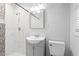Modern bathroom featuring a tiled shower, sleek vanity, and contemporary fixtures at 2425 Clifton Springs Rd, Decatur, GA 30034