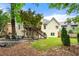 Lush backyard with a patio, perfect for outdoor gatherings and relaxation at 3714 Westbrooke Ne Cir, Brookhaven, GA 30319