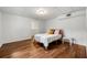 Bright bedroom with wood floors, a comfortable bed, and plenty of natural light at 3714 Westbrooke Ne Cir, Brookhaven, GA 30319