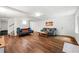 Spacious living room with hardwood floors, comfortable seating, and a bright, airy feel at 3714 Westbrooke Ne Cir, Brookhaven, GA 30319