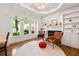 Inviting living room with fireplace, built-in shelving, and plenty of natural light at 3714 Westbrooke Ne Cir, Brookhaven, GA 30319