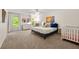 Large main bedroom with ensuite sitting area, crib, carpet and lots of natural light at 3714 Westbrooke Ne Cir, Brookhaven, GA 30319