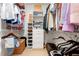 Walk-in closet with shelves, drawers, and rods for storage of clothes, shoes and accessories at 3714 Westbrooke Ne Cir, Brookhaven, GA 30319