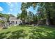 Large, well-maintained yard with a patio area, fire pit, and ample space for outdoor activities at 614 Cooledge Ne Ave, Atlanta, GA 30306