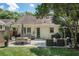 Relaxing backyard patio with a dining area and a cozy lounge, perfect for outdoor gatherings at 614 Cooledge Ne Ave, Atlanta, GA 30306