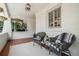Relaxing front porch featuring comfortable seating and a welcoming ambiance for enjoying outdoor moments at 614 Cooledge Ne Ave, Atlanta, GA 30306