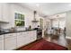 Well-appointed kitchen with stainless steel appliances, sleek countertops, and an open layout for easy entertaining at 614 Cooledge Ne Ave, Atlanta, GA 30306