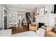 Spacious living room with a fireplace, hardwood floors, and plenty of room for entertaining guests at 614 Cooledge Ne Ave, Atlanta, GA 30306