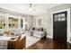Cozy living room with hardwood floors, ample natural light, and a comfortable seating arrangement for relaxation at 614 Cooledge Ne Ave, Atlanta, GA 30306