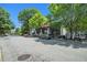 Quaint street featuring local businesses, ample parking, and charming sidewalk seating areas at 614 Cooledge Ne Ave, Atlanta, GA 30306