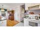 View of kitchen area and dining space, showcasing the layout and natural light at 6718 Oakhurst Ct, Douglasville, GA 30134
