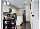 Eat-in kitchen features recessed lighting, ample storage, and modern appliances at 6940 Treeline Dr, Cumming, GA 30028