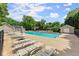 Enjoy the community pool with lounge chairs and a pergola in a fenced recreational area at 1172 Malvern Hunt Ct, Lawrenceville, GA 30043