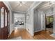 Welcoming foyer with hardwood floors and entrances to the living areas at 1172 Malvern Hunt Ct, Lawrenceville, GA 30043